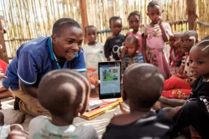 Children learning with Lenovo tablets Photo credit Theirworld and Mara Mambo Media resize scaled 1 ELOI Ministries